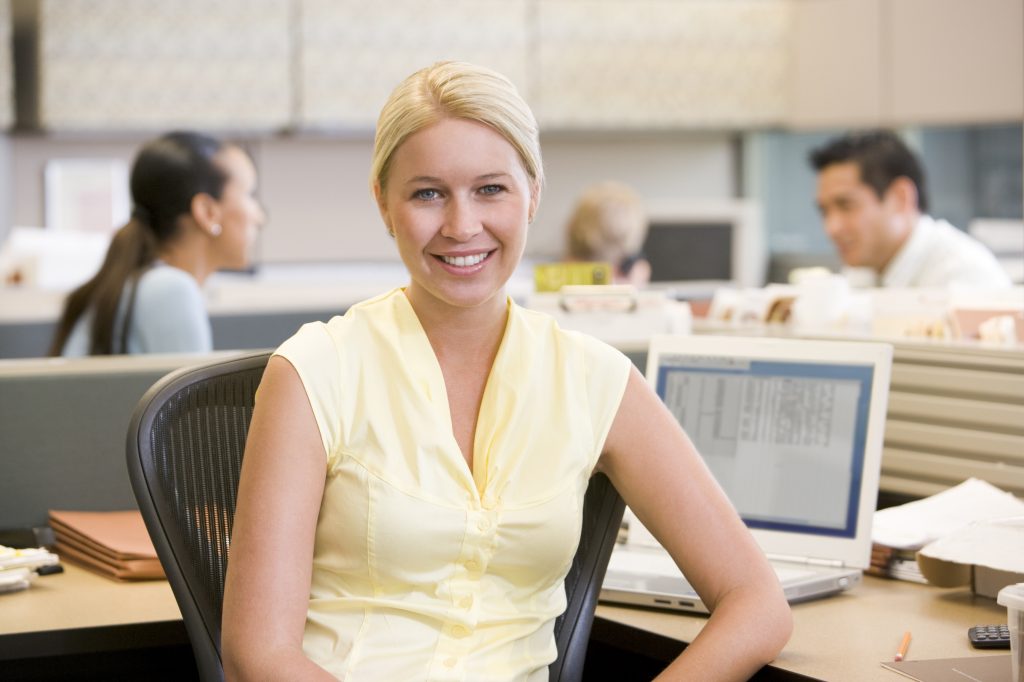 Businesswoman in Cubicle